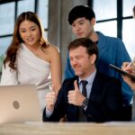 business-manager-show-thumbs-up-and-stay-with-his-2023-11-27-05-16-43-utc.jpg
