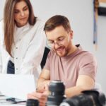 two-photographers-in-casual-clothes-is-working-ind-2023-11-27-04-49-56-utc.jpg